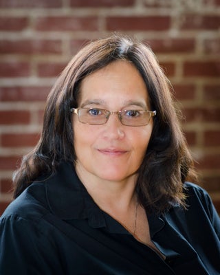 Portrait of Nadine Daubert, Realtor